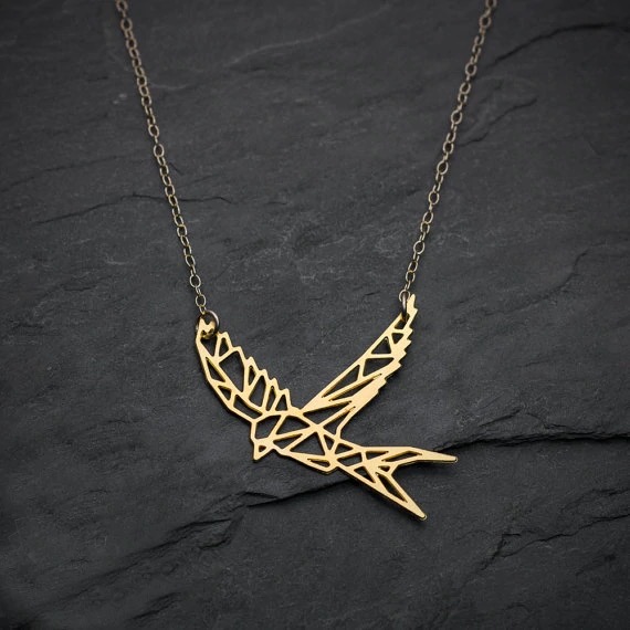 brass bird necklace